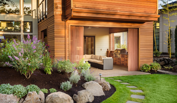 image of a modern home with stately landscaping