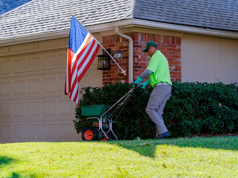 what-we-do image of a green group employee servicing a property